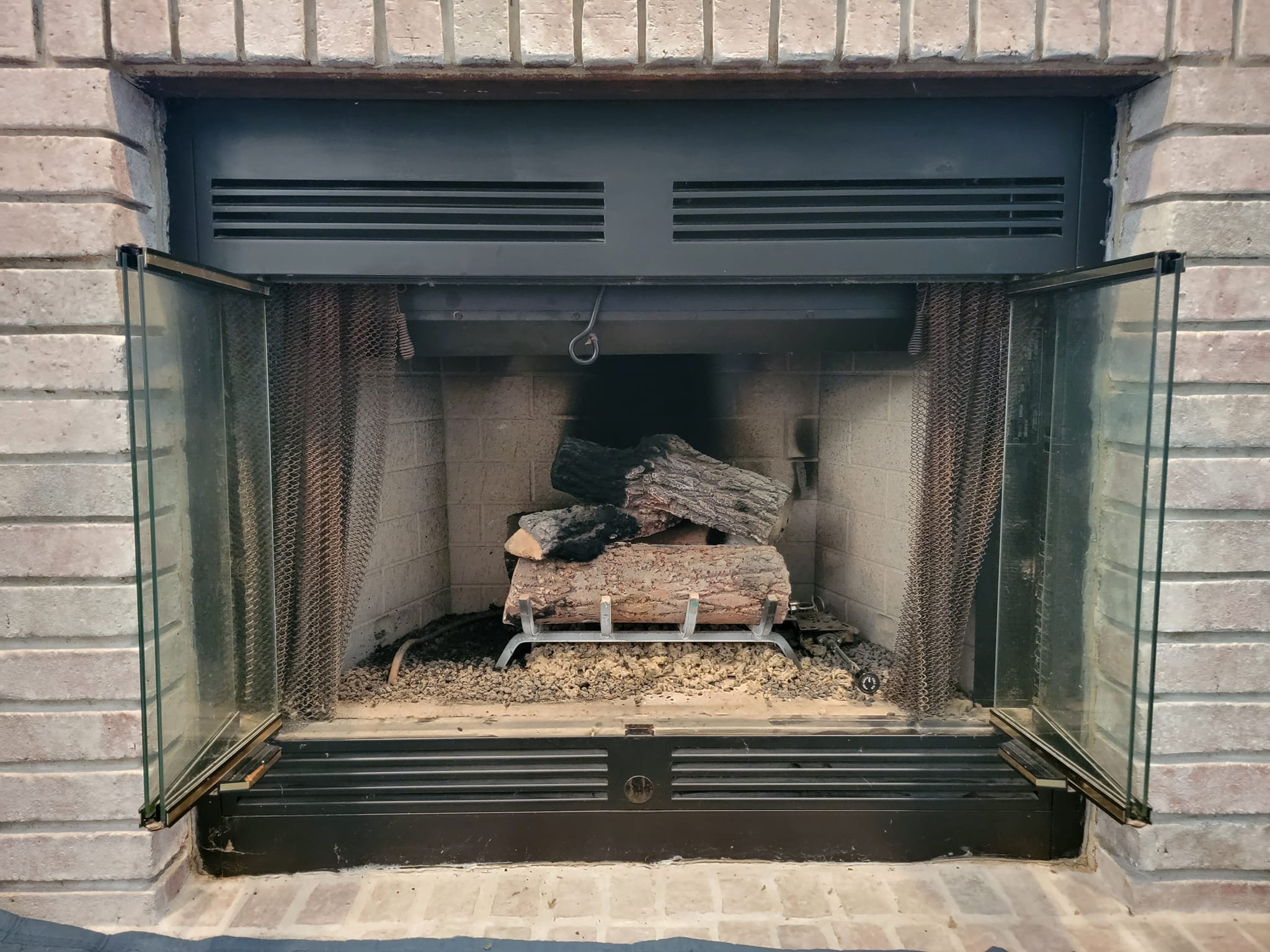 Old Gas Logs to New Gas Insert Before